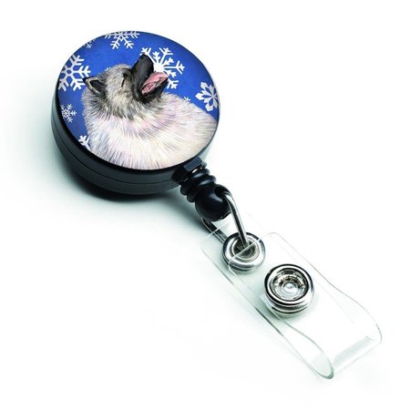 CAROLINES TREASURES Keeshond Winter Snowflakes Holiday Retractable Badge Reel SS4626BR